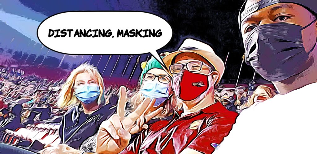 Distancing, Masking... Photo of our masked fam at USC game.