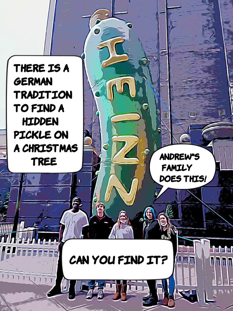 the cousins stand before a giant Heinz Pickle